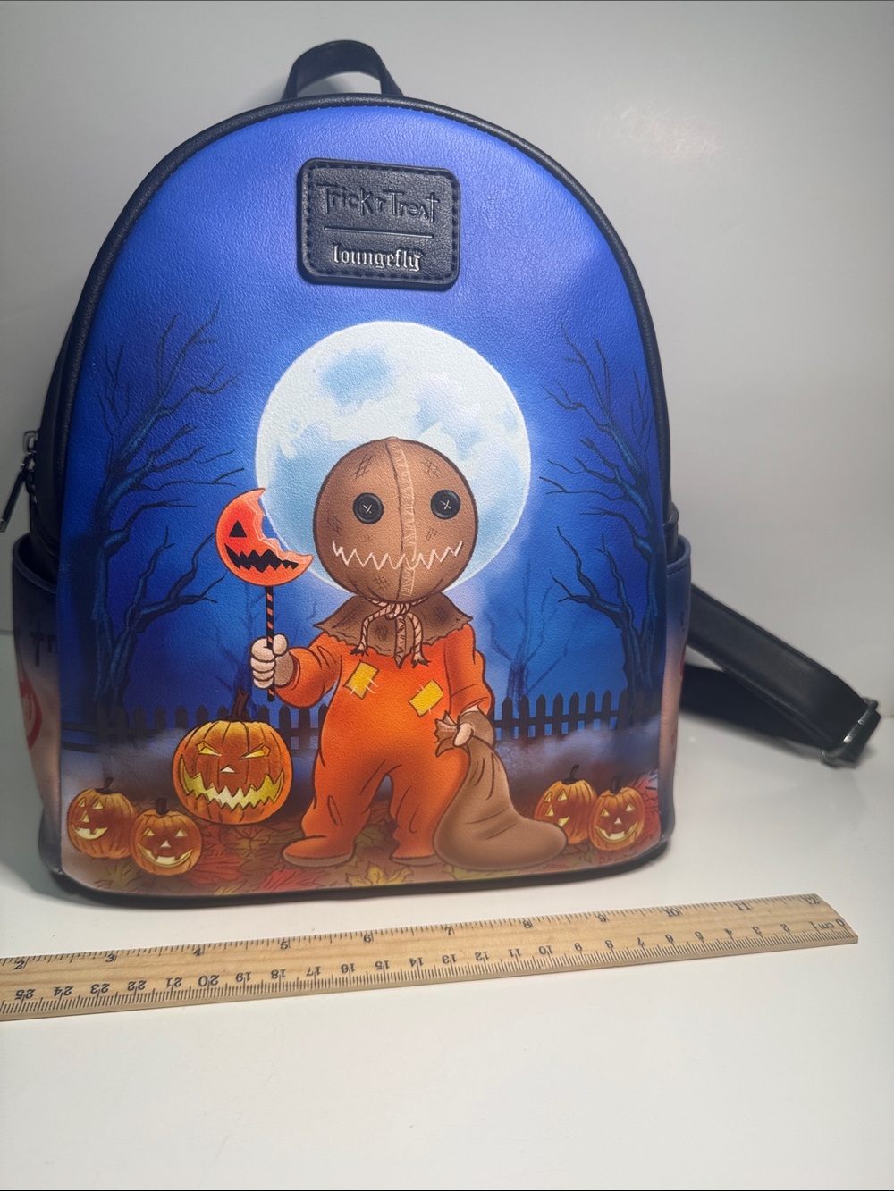 Loungefly Trick 'R Treat Sam glow-in-the-dark mini backpack purse fabulous